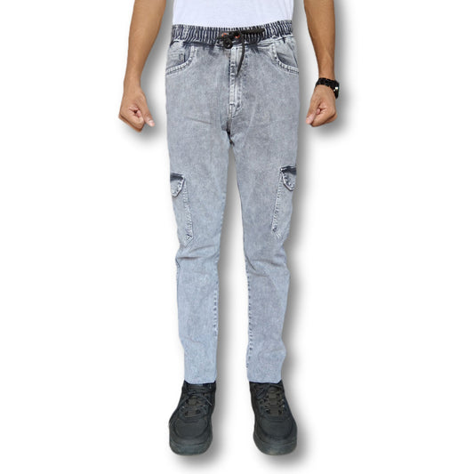 Light grey denim cargo joggers worn by a person on a white background